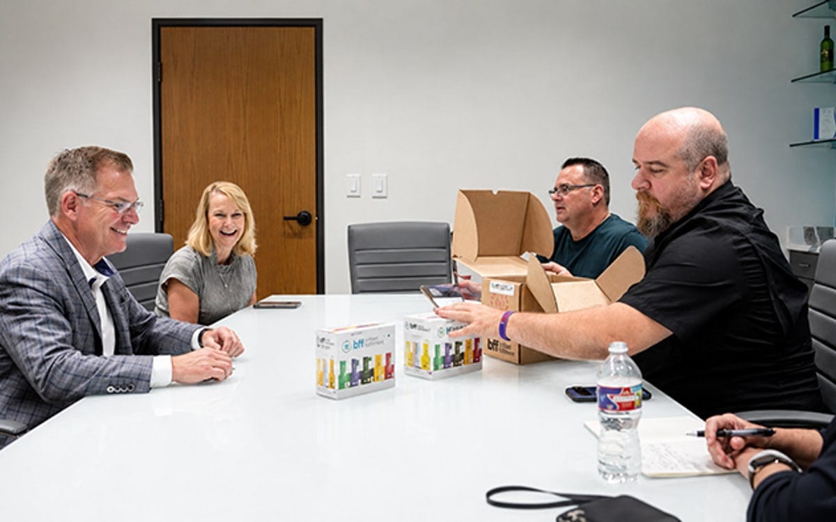 The Brilliant Fulfillment team reviewing client product at the Grapevine facility